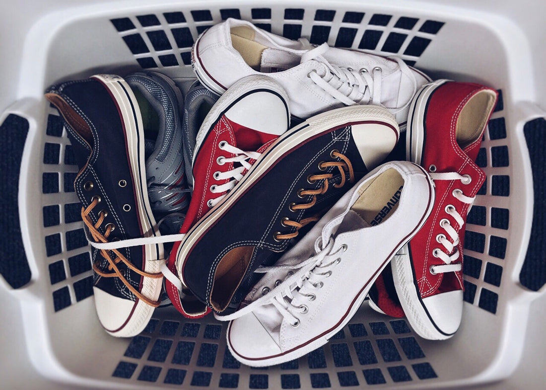 Laundry basket full of sneakers